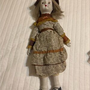 Vintage Style Porcelain Doll with Brown and Cream Dress